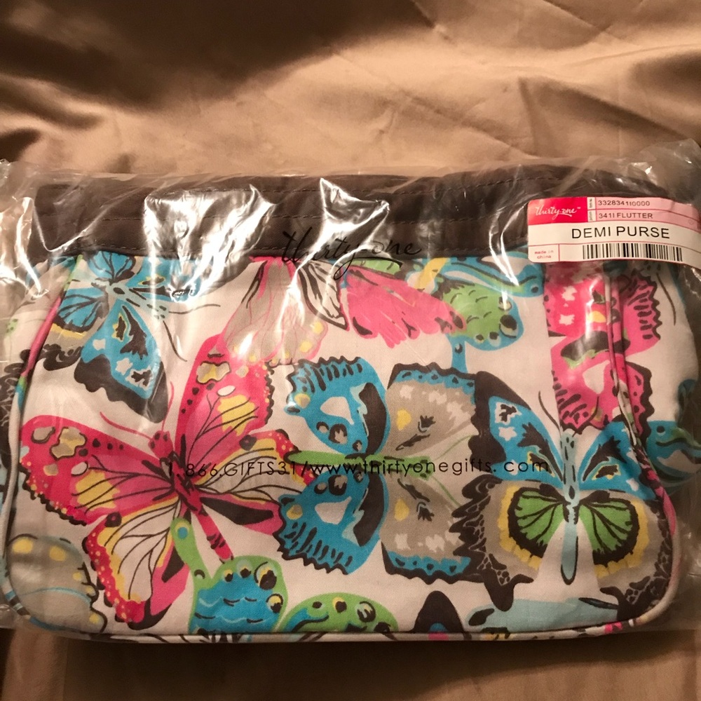 NWT Demi Thirty-one purse.